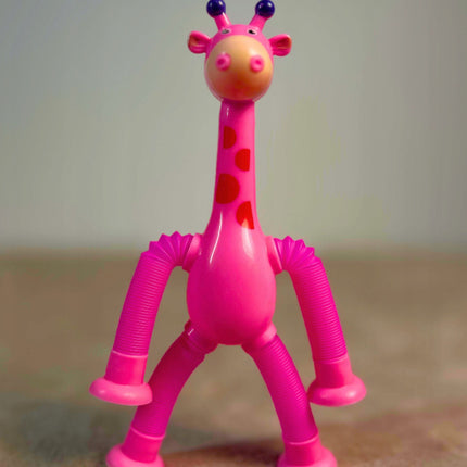 FIGURKA SPRĘŻYNOWA TELESKOPOWA PRZYSSAWKA ŻYRAFA W KOLORZE RÓŻOWYM